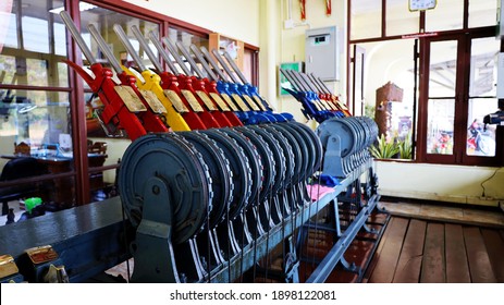 Surin, Thailand - January 20,2021: Mechnical Levers Used To Operate Railway Signals And Points. Mechanical Interlocking With Semaphore Signals Equiped With Warner Home And Starter Signals.