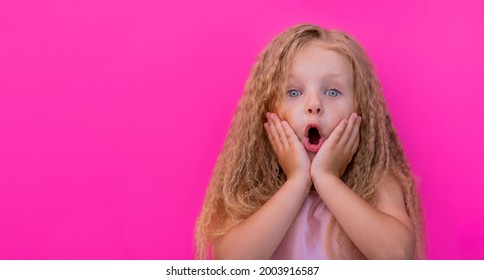 Surprise Portrait Of Amazed Little Girl With Open Mouth Wow On Pink Background Advertising For Kids Store