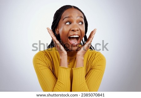 Surprise, wow and hands on face of black woman in studio for announcement, news or promo on grey background. Omg, emoji and excited African female model with secret, deal or giveaway, lotto or info
