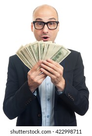 Surprised Bald Man Holding A Lot Of Money. Isolated Over White