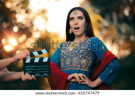 Surprised Bollywood Actress Wearing an Indian Outfit and Jewelry - Professional cinema star shooting a scene
