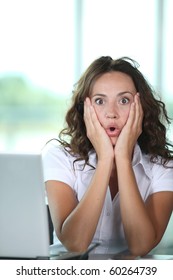 Surprised businesswoman in the office - Shutterstock ID 60264739
