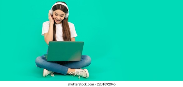 Surprised Child Girl Use Wireless Computer For Video Call Or Listen Webinar In Headphones, Chatting. School Girl Portrait With Laptop, Horizontal Poster. Banner Header With Copy Space.