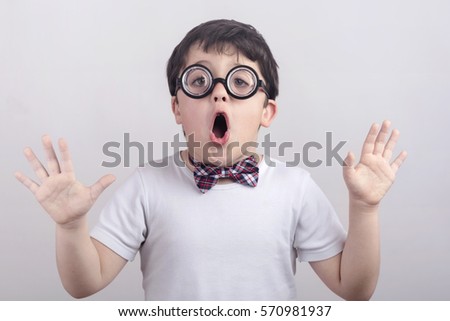 Surprised child with glasses