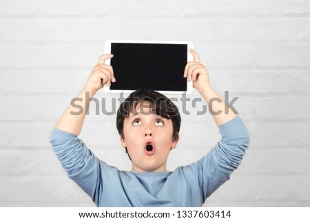 Similar – surprised boy with a blackboard