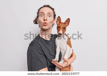 Similar – Foto Bild Hübscher schwarzer Hund mit brauner Zeichnung schaut zur Seite