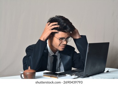 A surprised or disbelieving expression, seeing something unexpected on the laptop screen.