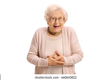 Surprised elderly woman looking at the camera and laughing isolated on white background