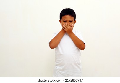 Surprised Excited Asian Boy Standing Isolated On White Background With Copyspace