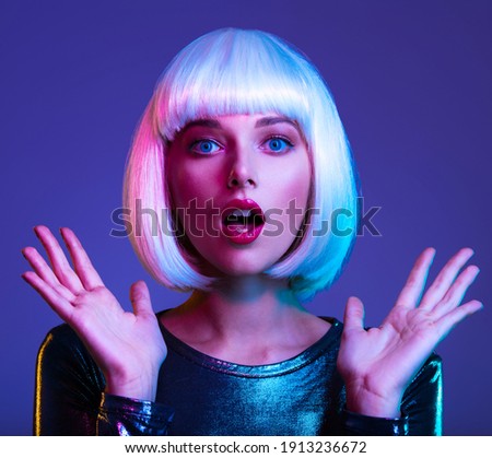 Similar – Young blonde woman asking for silence