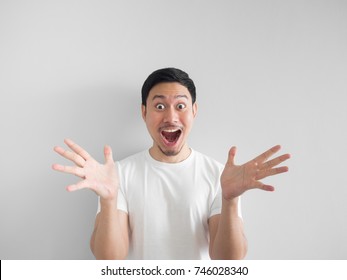 Surprised Face Of Happy Asian Man In White Shirt  Light Grey Background.