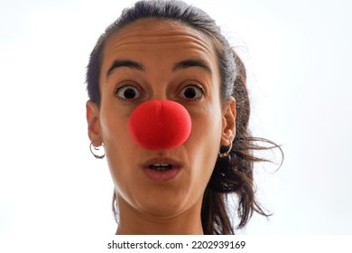 Surprised Female Clown Looks At Camera