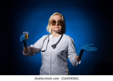 surprised female doctor in a white coat, gloves and glasses does not know what to do with a urine test in a jar on a dark background, hard light