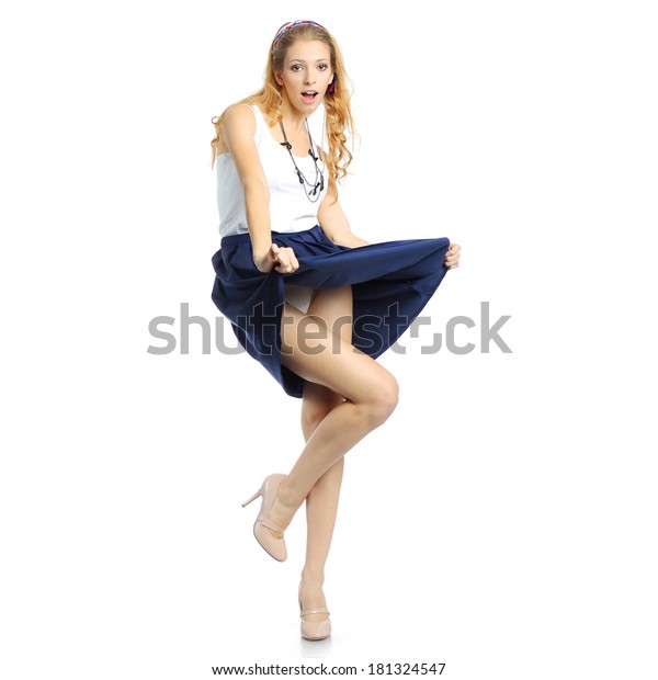 Photo De Stock Surprised Girl Lifts Her Skirt 181324547 Shutterstock 3733