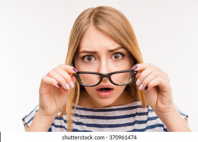 Surprised Girl Taking Off Her Glasses