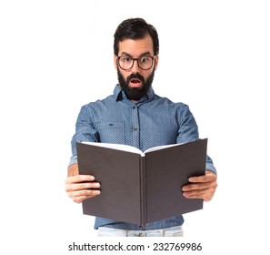 Surprised Hipster Man Reading A Book