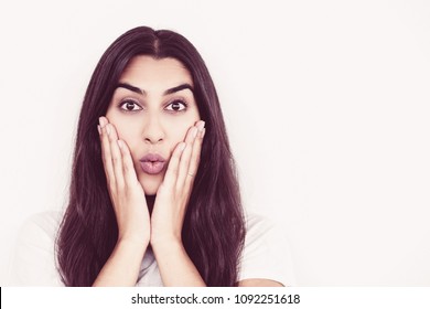 Surprised Indian Woman Touching Face With Hands. Young Woman Shocked With Received News. Advertisement Or Amazement Concept