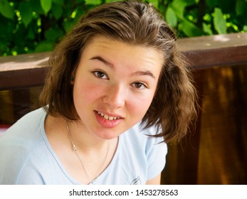 Surprised Joyful Teen Girl Close-up Outdoors Portrait. Real People Every Day Life