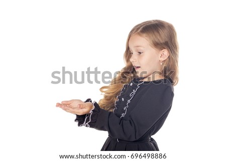 Surprised little girl holding something on the hands. Concept for adv. Isolated on white background.