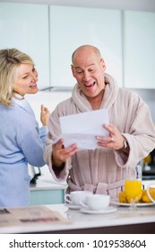 Surprised Man Reading Mail