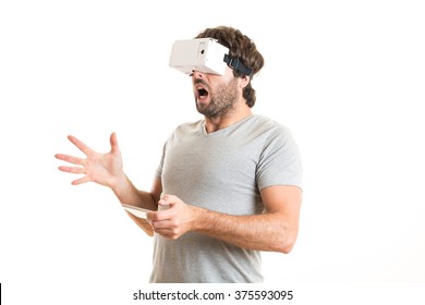 surprised man using virtual reality goggles