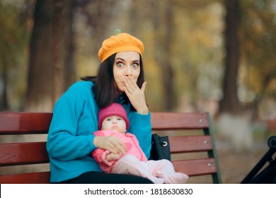 Surprised Mother And Daughter Posing In The Park. Mom And Cute Baby Girl Looking At The Camera
