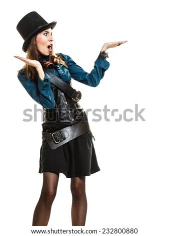 surprised steampunk retro woman or cabaret girl showing open hand palm with copy space for product text studio shot isolated on white background