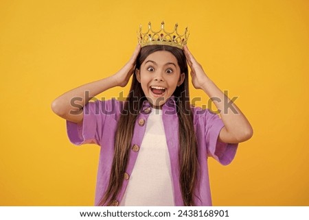 surprised teen girl look girlish in the crown. princess crown fashion. teen girl winner of girlish crown. girl wearing a crown. girlish look. waht a surprise