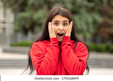 Surprised Woman Surprised At Discounts At A Store On The Street