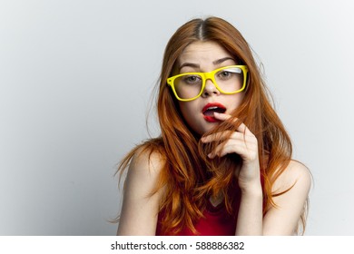 Surprised woman in glasses