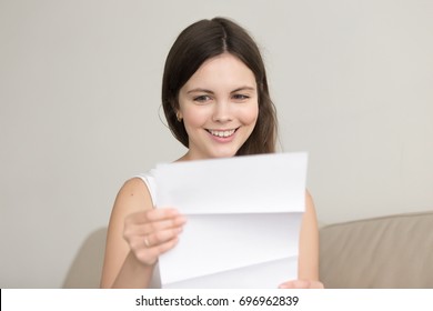 Surprised Woman Reading Letter With Unexpected Good News, Feeling Excited About Unbelievable Offer In Written Notification, Happy Teenager Enjoying Successful Positive Result, Passed Exam, Got Hired