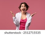 Surprised woman, she expresses WOW, cant believe. Impressed lady trying to get attention. Concept of sales, profitable offer. Excited romantic girl on pink background. High quality