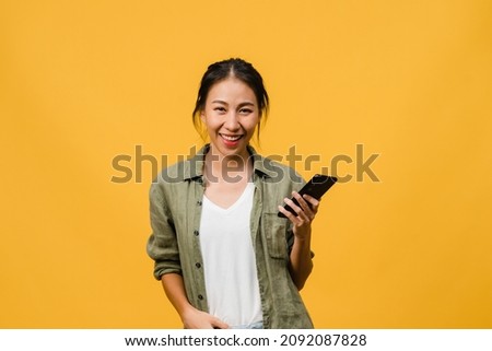 Similar – Image, Stock Photo Smart casual lady with bag and bottle walking on street