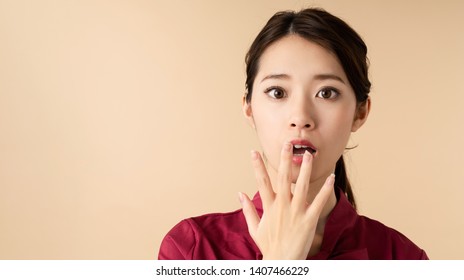 Surprised Young Asian Woman. Shocked Girl.