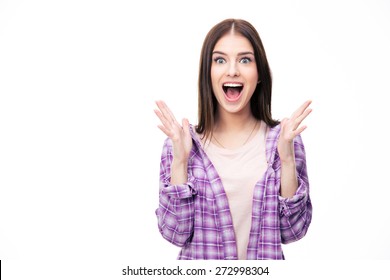 Surprised young female student over white background. Looking at camera. 