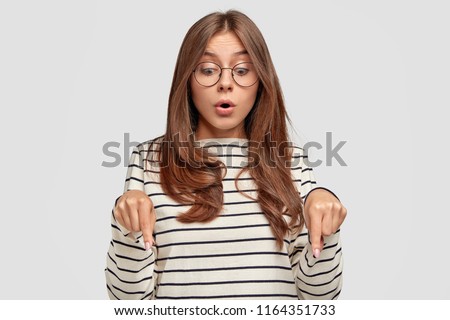 Similar – Image, Stock Photo Young woman looks amazed on the beach