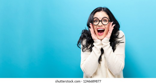 Surprised Young Woman Posing On A Solid Background