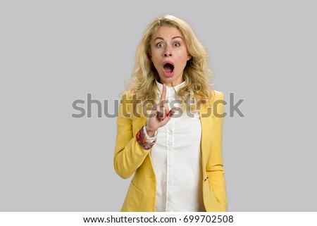 Similar – Image, Stock Photo Amazed woman, she expresses WOW. Impressed lady on yellow background. Great news