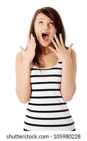 Surprised Young Woman Screaming In Excitement And Showing Hands And All Fingers. Long-hair Brunette With Eyes Upward And Open Mouth Wearing Striped, Black And White Top. Isolated On White Background.