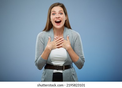 Surprising Woman Isolated Portrait. Blue Studio Background.