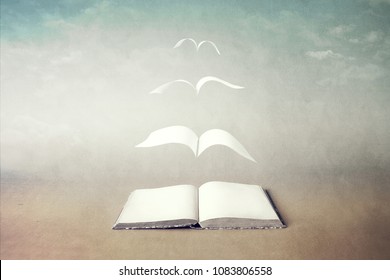 surreal book concept pages flying out of book - Shutterstock ID 1083806558
