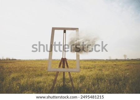 surreal cloud escapes from a frame, concept of freedom and lifeeasel
