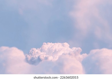 Surreal cloud podium outdoor on blue sky pink pastel soft fluffy clouds with empty space.Beauty cosmetic product placement pedestal present promotion minimal display,summer paradise dreamy concept.