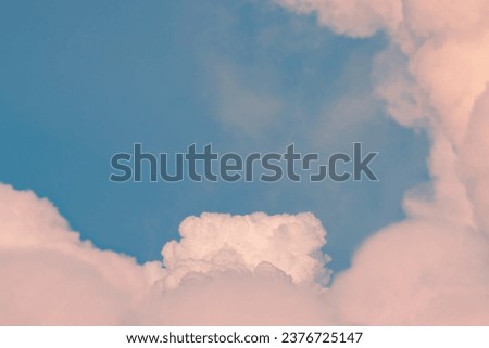 Surreal cloud podium outdoor on blue sky pink pastel clouds with empty space.Beauty cosmetic product placement pedestal present promotion minimal display,summer paradise dreamy concept.

