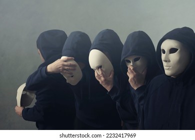 surreal duplicate man with mask, concept of identity crisis with various personalities - Shutterstock ID 2232417969