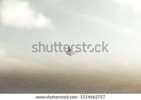 surreal image of a dreamy woman traveling on a cloud