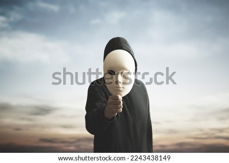 surreal image of man hiding behind a mask, concept of identity crisis