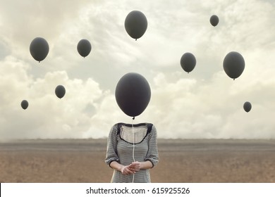 surreal image of woman and blacks balloons flying - Shutterstock ID 615925526