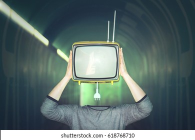 surreal man remove television from his head