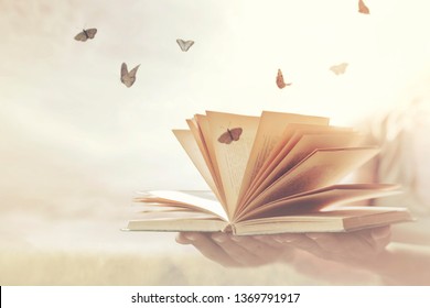 surreal moment of freedom for butterflies coming out of an open book - Shutterstock ID 1369791917
